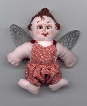 Kewpie pin doll